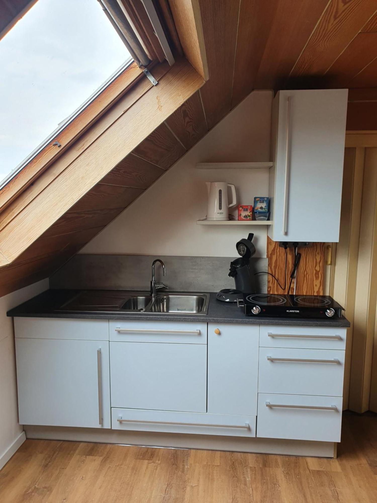 Moments Apartment Rust Rum bild