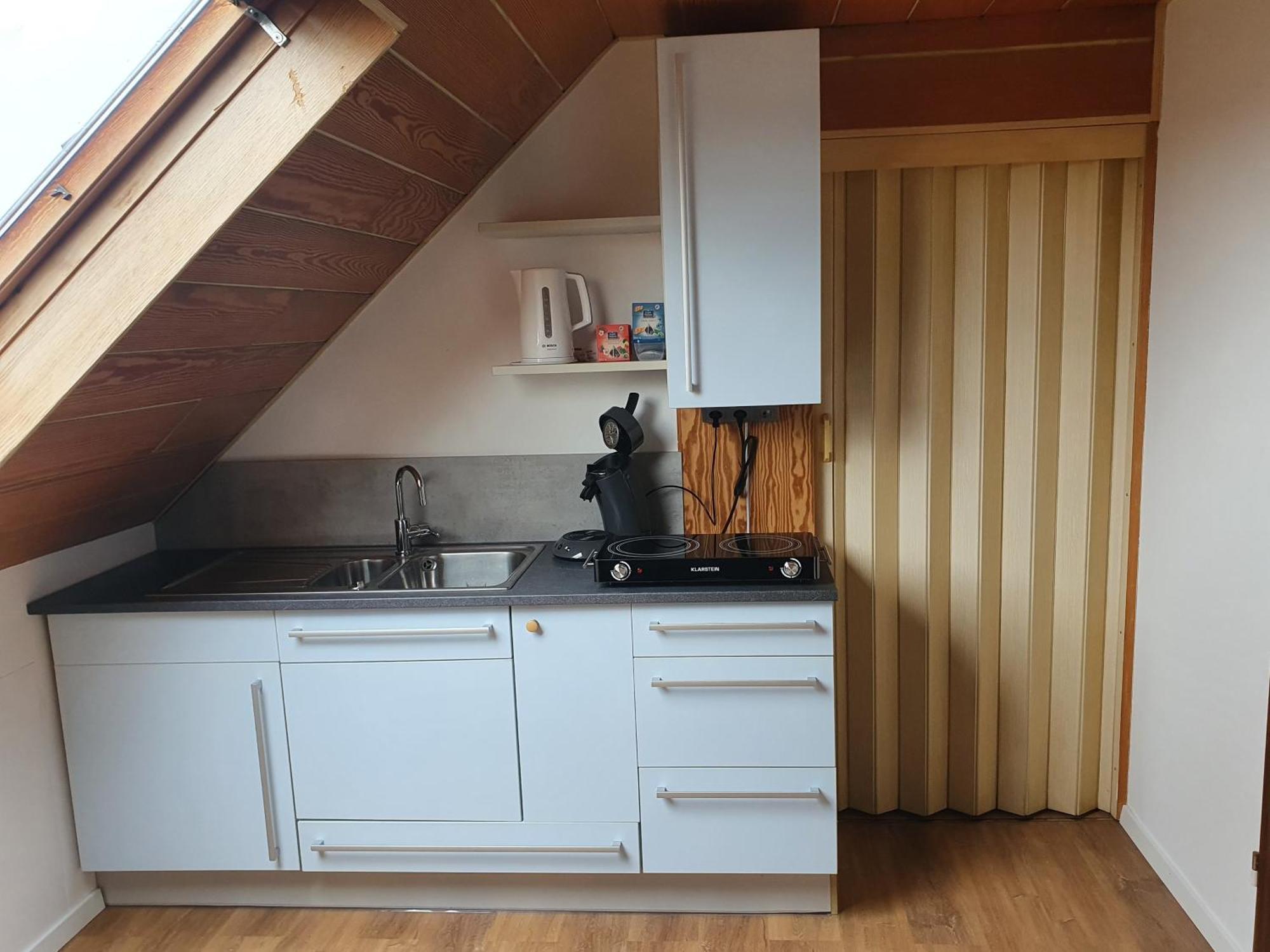 Moments Apartment Rust Rum bild